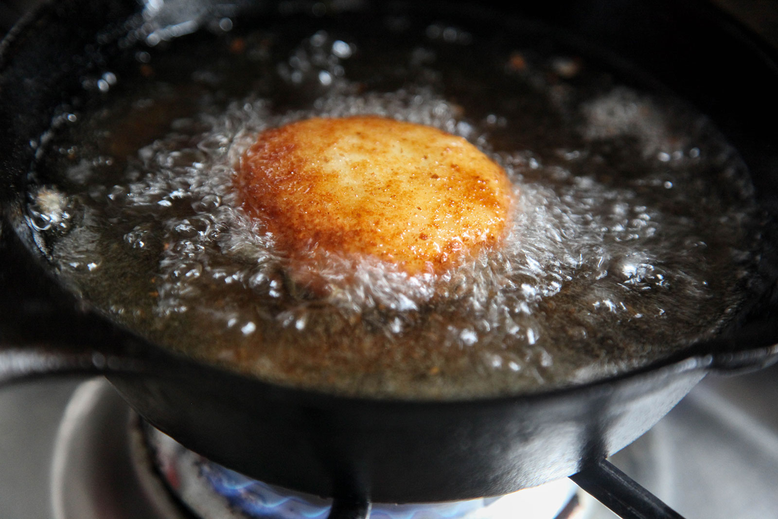 Frying croquette in oil for making Perfect Potato Croquettes (Bangladeshi Alu Chops)