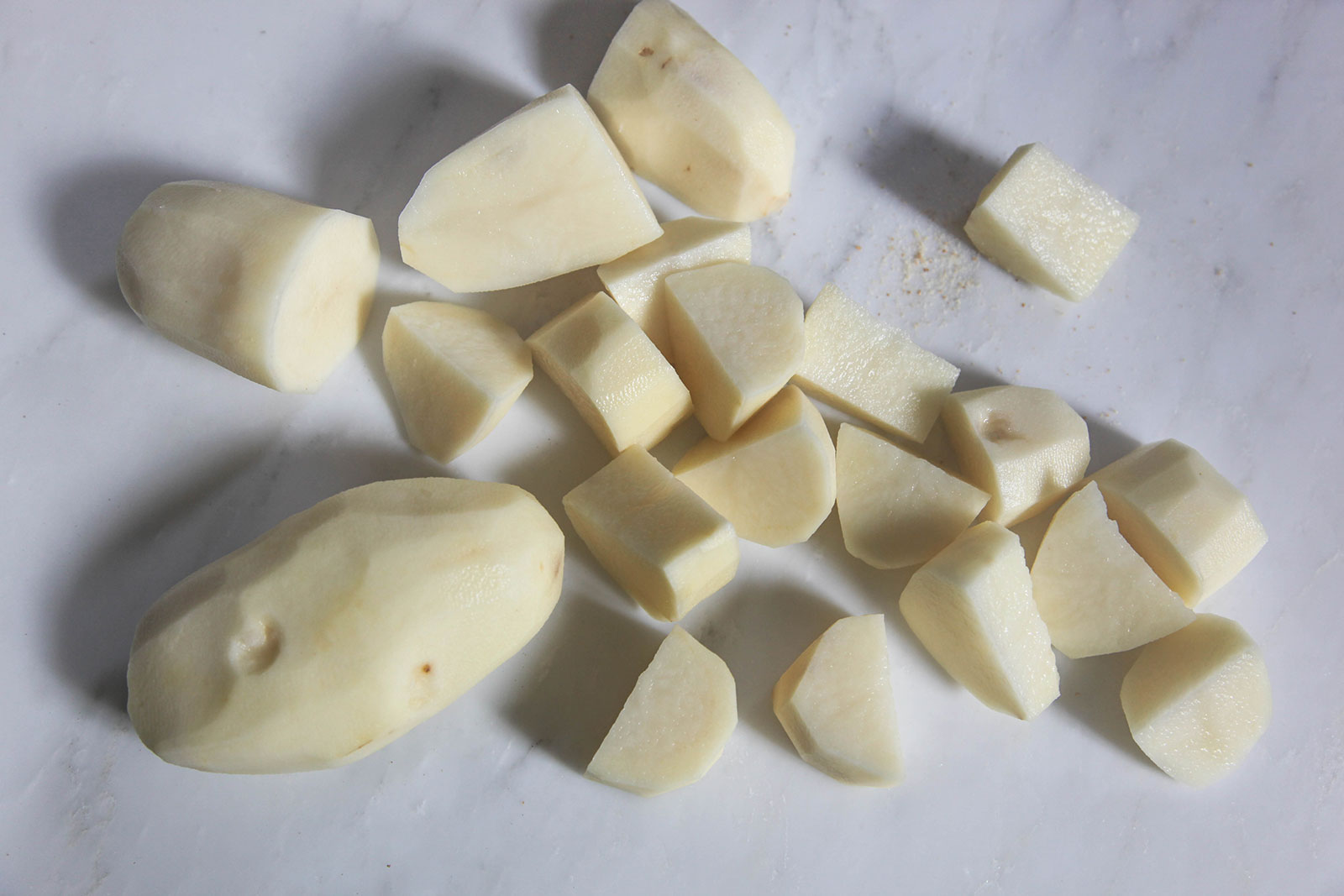 Potato cut for boiling, to make Perfect Potato Croquettes (Bangladeshi Alu Chops)