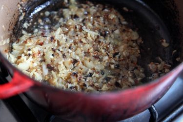 Sauteeing onion, garlic, ginger for making Perfect Potato Croquettes (Bangladeshi Alu Chops)