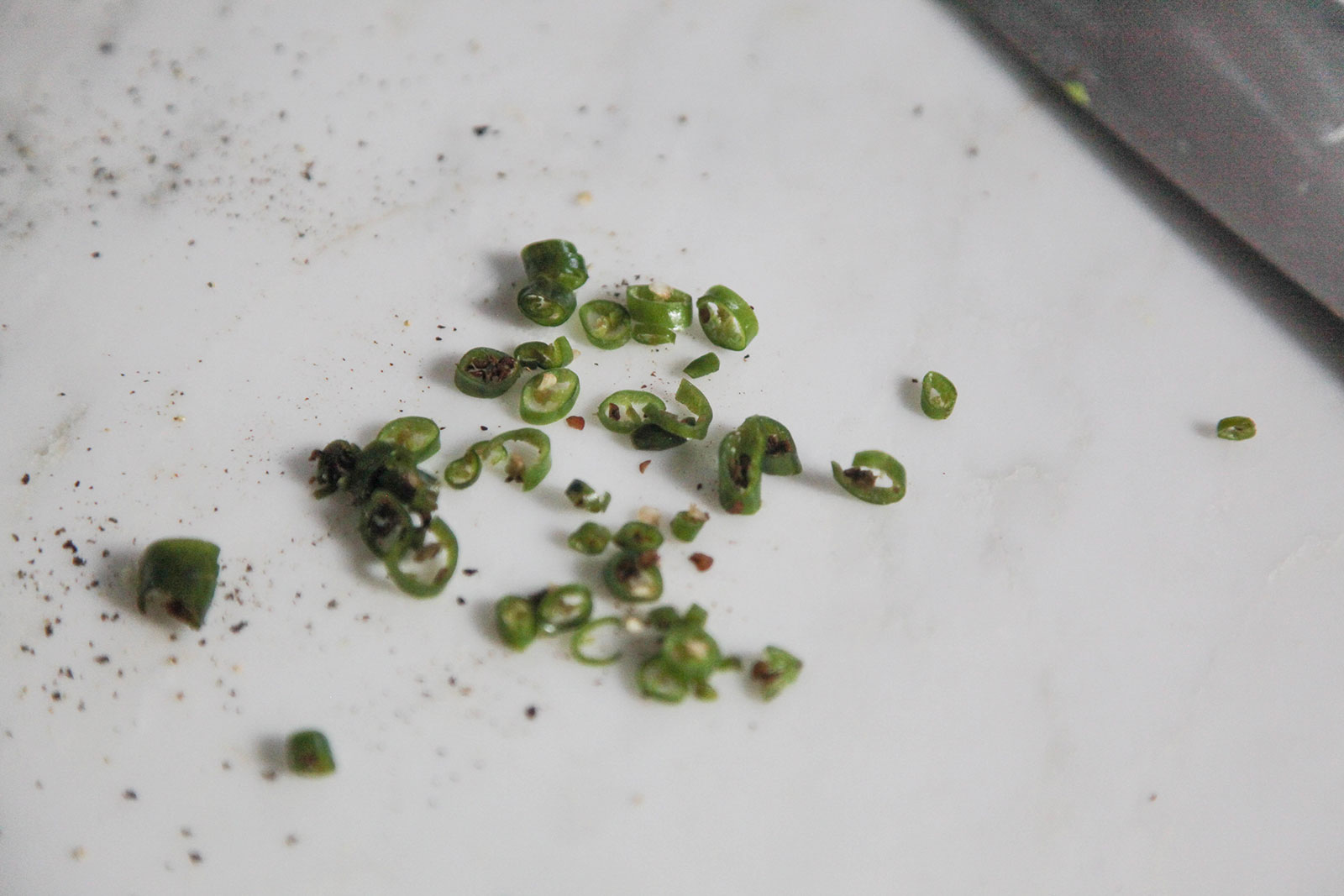 Chopped green chilies for making Perfect Potato Croquettes (Bangladeshi Alu Chops)