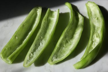 Chichinga sliced in half with seeds scooped out