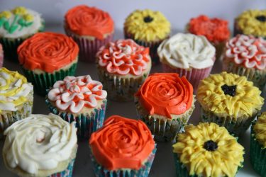 moist fluffy cupcakes with vanilla buttercream icing