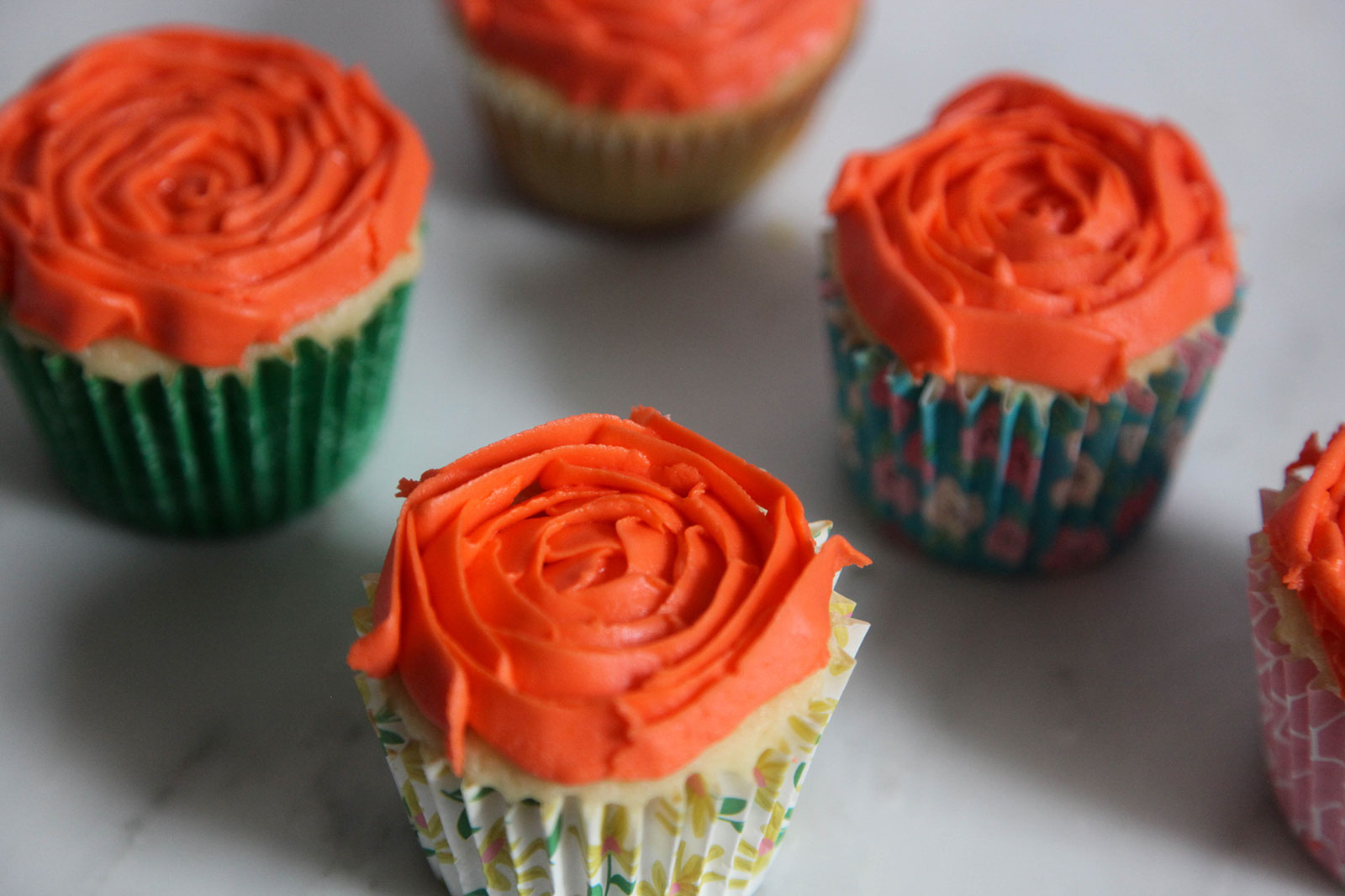 moist fluffy cupcakes with rosette decoration