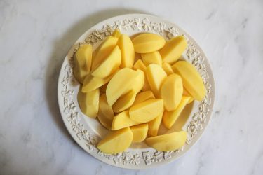 small potatoes peeled & quartered vertically