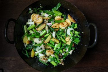 Green Garlic Sautéed with Shrimp, Potatoes & Grated Coconut, just cooked in a wok