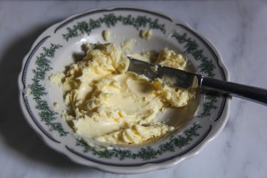 room-temperature butter in a shallow bowl
