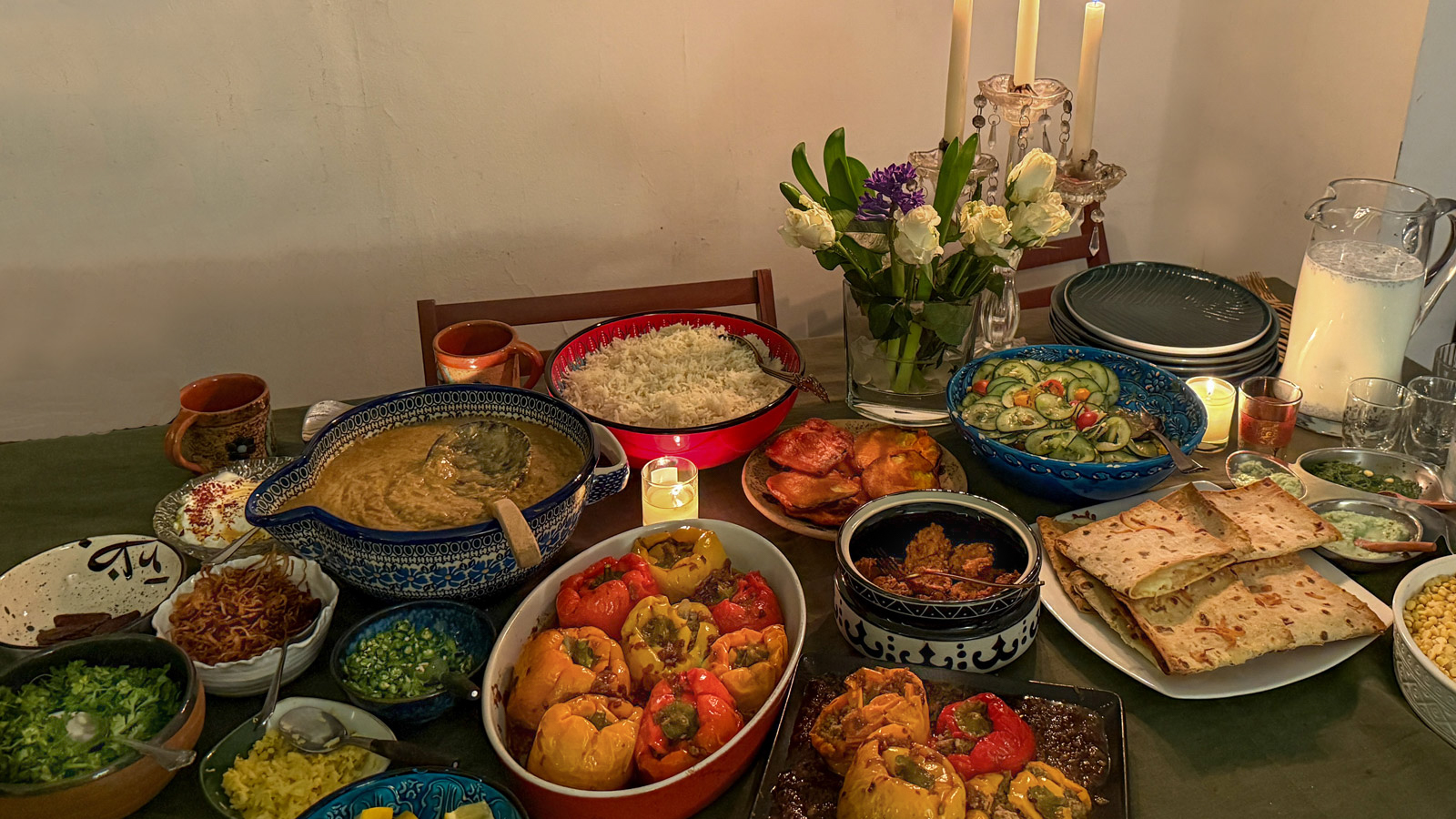 table with all the dishes I made for my Iftar gathering, including Rose Milk