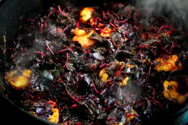 amaranth leaves added to shrimp & spice mix