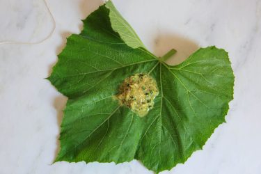 lau leaf with chicken and marinade, shown before wrapping