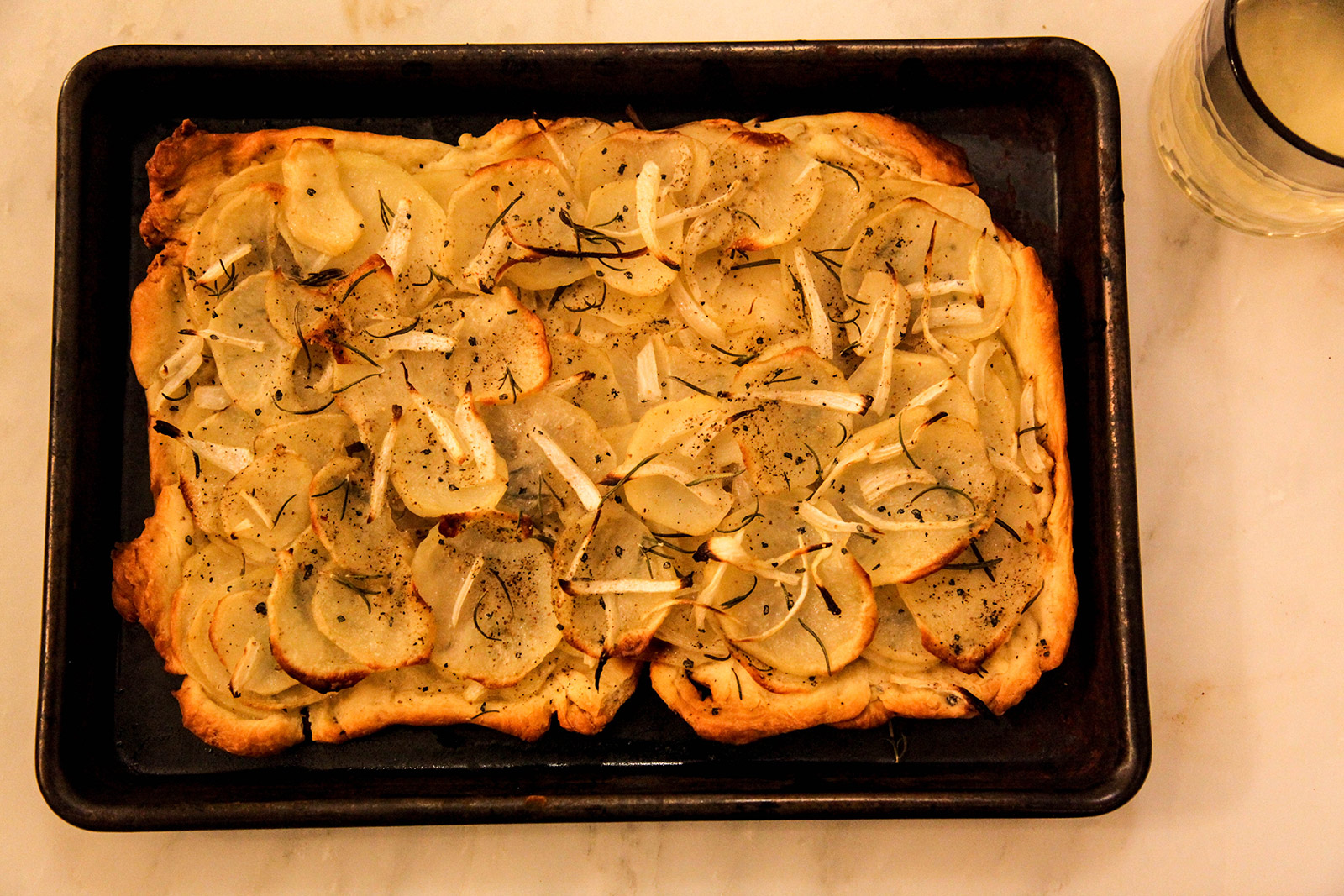 potato pizza with fresh rosemary, olive oil & sea salt