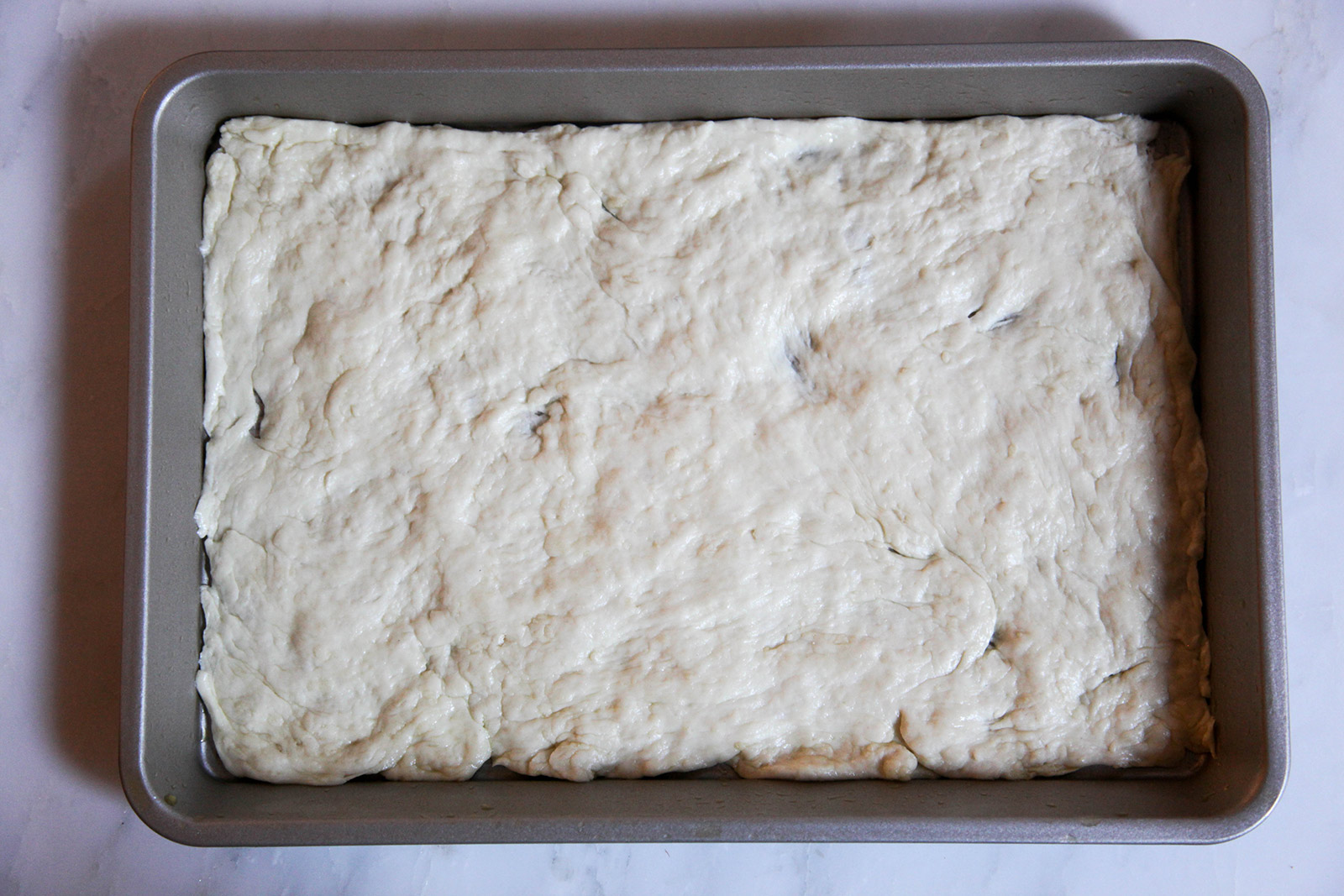 Stretched dough for pizza base