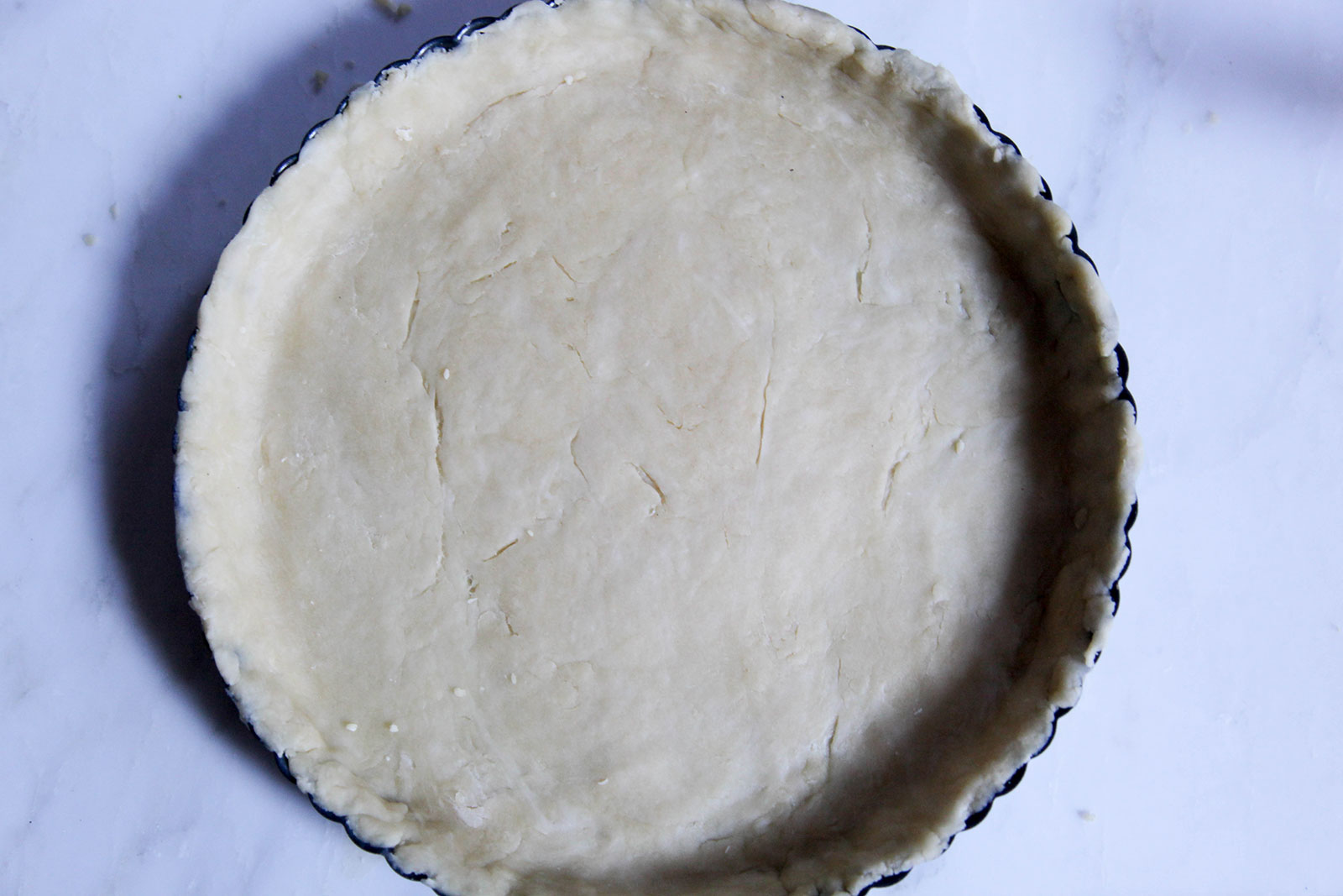 Unbaked Pie Crust for Quiche with Leeks, Asparagus, Baby Spinach, and Shredded Chicken