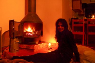 i was warming up by the fireplace, at one of the places we stayed at