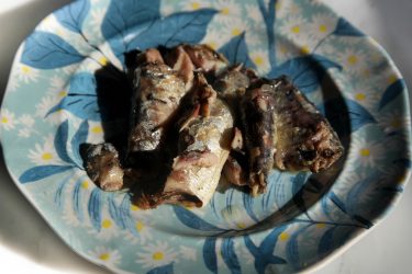 Sardines drained of liquid from can, ready for mashing