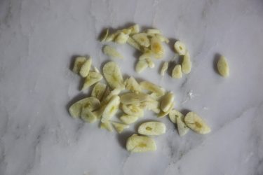 Garlic cloves cut into thin slices