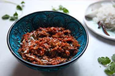 Tomato Bhorta in a dish, ready to serve