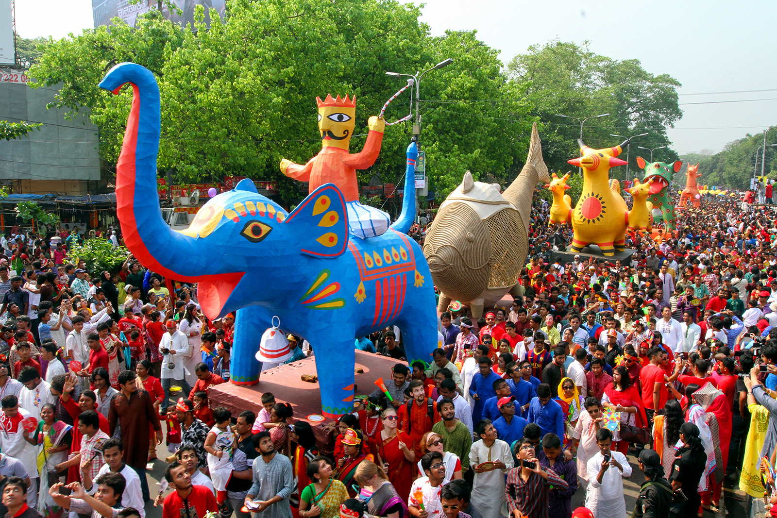 Parade with giant papier mache animal sculptures in Dhaka, Bangladesh to celebrate Pohela Boishakh (Bengali New Year)